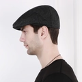 Side view of men's dark grey herringbone flat cap on model showing retro silhouette - 58cm / Dark Gray