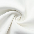 Macro shot of high-quality white twill fabric showing detailed texture and soft draping - S / White