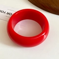 Modern wide resin round bangle in bright solid red finish with polished surface - Red