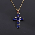 Close-up of golden cross pendant with blue zircons on a delicate chain necklace - Pendant Only / Blue
