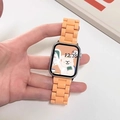 Orange resin watch band with three-link structure for Apple Watch, handheld view - Orange