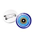 Blue Turkish evil eye brooch pin with gold center and polished glass dome on white background - Silver-9