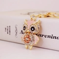 Cute pink owl keychain in gold plating with crystal rhinestones and enamel finish - Peach