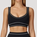 Black brushed yoga bra with white contrast stitching and deep U-back design - Premium Black