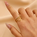 Minimalist double layer gold heart ring with pavé zircons worn on hand over silk - 18K Gold Plated Zirconia Double Heart (9250)