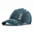 Distressed dark blue denim baseball cap with vintage frayed holes and retro street style - Adjustable / Dark Blue