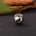 Polished 20mm brown striped agate sphere placed on a natural textured surface - 20*20mm / Grey I Love Zebra