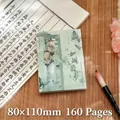 A7 Chinese landscape notebook with green cover featuring lanterns and 160 writing pages - Smoke and Dream (Pale Green)
