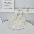 Macro detail of white fabric tote featuring large 3D 3D romantic rose flower textures - White