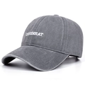 Close-up of COVENRAT white embroidery on dark gray washed cotton baseball cap - Gray
