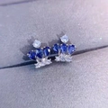 Elegant crown-shaped sapphire earrings in silver finish with sparkling zircons - Royal Blue