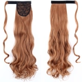 Reddish brown wavy ponytail extension with velcro strap and internal lace net - Auburn