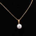 Elegante collana placcata in oro rosa 18K con ciondolo a perla tonda bianca lucida - Oro