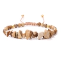 Detail of hand-woven bracelet with natural gravel stones and adjustable cord - Map Stone (FA0386)