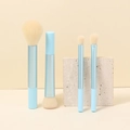 Light blue 4-piece makeup brush set with beige bristles on decorative stone - RT Blue / 4 Pcs + OPP Bag