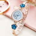 Fashionable rose gold quartz watch with blue petals and heart accents for women - Gold Band + Sky Blue Crystal