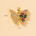 Detailed view of a 1.8x2cm golden butterfly pendant with colorful zircon stones - B-Butterfly (1.8x2cm)