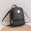 Fashionable black quilted mini backpack for women with gold hardware and versatile straps - Black