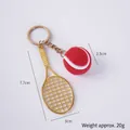 Mini tennis racket keychain with red ball and golden finish for sports fans - 2.5cm Large Red Tennis Ball + Gold Racket