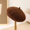 Breathable brown knitted beret hat with pumpkin top on a wooden display stand - M (56-58cm) / Brown
