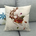 Housse de coussin de Noël avec Père Noël et traîneau sur fond en lin beige naturel - Père Noël Traîneau à Rennes Village