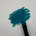 Single teal oil pastel stick showing smooth texture and professional color payoff - Dark Green