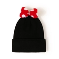 Close-up of ribbed knit texture on black beanie with red polka dot bow decoration - S (54-56cm) / Black