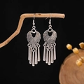 Vintage bohemian silver metal tassel earrings hanging on a rustic branch background - E2454/Ethnic Carved
