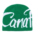 Detail of green knitted beanie featuring thick white Caraf jacquard lettering texture - M (56-58cm) / Green