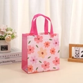 Pink floral non-woven tote bag with reinforced handles for shopping and gift packaging - Light Pink Floral / 36x32x12cm