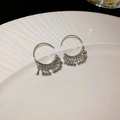 Macro detail of silver bohemian hoop earrings with beaded tassels on white plate - 13# Hook - Silver - Curved Tassel