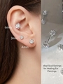Close-up of classic spherical stud earrings with cubic zirconia inlay in 3mm, 4mm, 6mm sizes - 3mm Double Drill Ball Pair