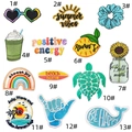 Detail view of 13 colorful summer-themed embroidered iron-on patches with neat edges - 13-Piece Set