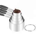Set of five stainless steel measuring cups with black handles and clear engraved scale - 5-Piece Measuring Cup Set (Black Handles)