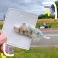 Detail of cute cat shaped acetate hair clip with marble blue and orange texture - Camo Cyan