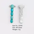 Vintage silver alloy pendant with five turquoise stones featuring natural cracked texture - Five-Stone Connector