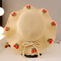 Kids beige straw sun hat with crochet cherry patches and a decorative bow tie - Cherry Straw Hat / Beige