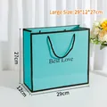 Tiffany blue square gift bag with black trim and Best Love text for boutique shopping - Large / Light Blue