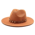Close-up of woven straw texture with leather belt and silver metal studs on cowboy hat - M (56-58cm) / Caramel