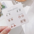 Set of 6 pairs gold and silver stud earrings on a weekday display card - Fish Tail and Starfish Style (E0118-1)