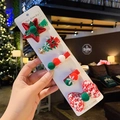 Detailed view of 5-piece Christmas tree hair clip set with red and green fabric bows - H3-5# Five-pointed Star Christmas Design (cardboard Packaging)