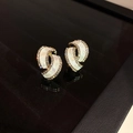 Close-up of golden geometric earrings with iridescent mother of pearl and pave crystals - Alloy/Rhinestone/Silver Pin/Faux Shell / Gold