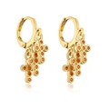 Detail of 18K gold plated hoop earrings with tiered orange zircon pendants on white background - Orange