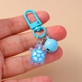 Cute blue translucent turtle keychain with a matching bell and metal ring clasp - Blue