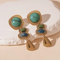 Detailed view of vintage geometric earrings with green resin stones and hammered metal drops - Green Geometric Drops (With Silver Pin)