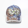 Detail of floral baseball cap with pearls and rhinestones on infinity logo and brim - Adjustable / Blue Mask