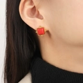 Vintage gold-framed red square stone titanium steel stud earrings shown on model - Gold Red Stone Style (F1408)