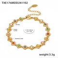 Detailansicht eines Edelstahl-Armbands mit bunten Öltropfen-Blumengliedern in Gold - Gold Emaille Armband (TXE176) / 150+50mm