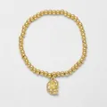 Goldenes Perlenarmband mit mikroverziertem Muschel-Anhänger aus Zirkonia - Gold
