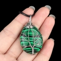 Green malachite tree of life teardrop pendant wrapped in silver wire on black cord - Malachite (Synthetic)